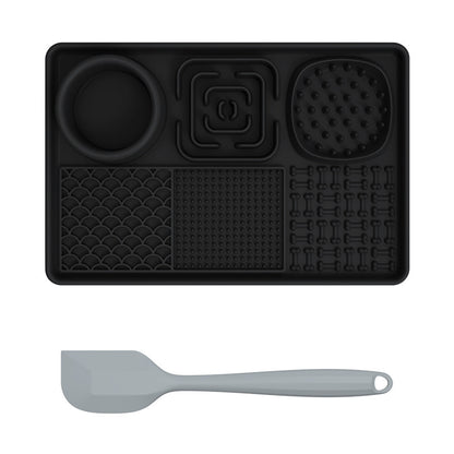 Dog and cat lick mat from PawBeing, a slow feeder for anxiety relief and healthy eating, shown on a table with pet treats.