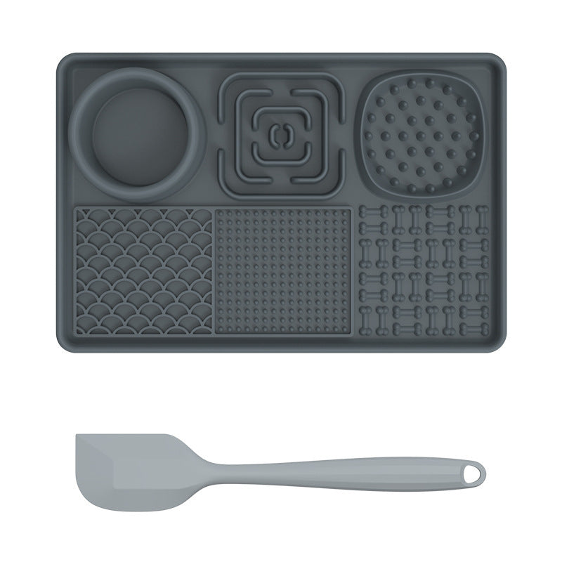 Dog and cat lick mat from PawBeing, a slow feeder for anxiety relief and healthy eating, shown with spread treats on the surface.